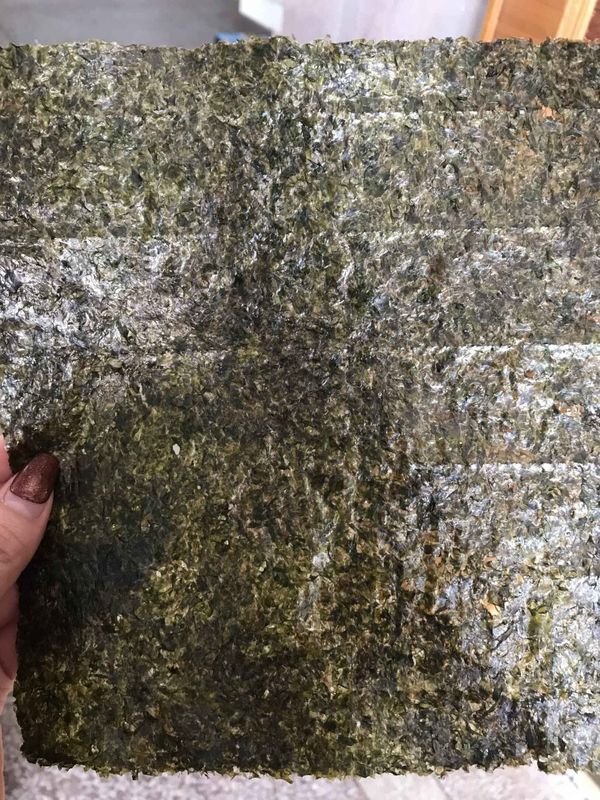 Évaluez une décoration rôtie sèche de nourriture de feuilles d'algue de sushi de Nori d'algue