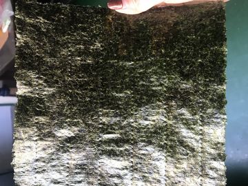 Feuilles d'algue vert-foncé de Nori de sushi de catégorie comestible